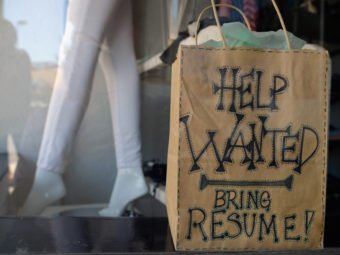 A "help wanted" sign earlier this year in the window of a clothing store in Pasadena, Calif. (Kevork Djansezian/Getty Images)