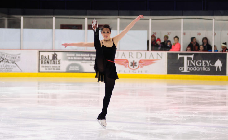 Alexandra Sargent punctuates her performance with a high kick that prompts a brief balancing act on the toe of a single blade. Sargent, also a skating instructor, danced to Lady Gaga’s Americano during Juneau Skating Club’s annual holiday recital.