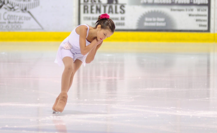 Megan Renkes performs a solo routine to the music Silent Night during Juneau Skating Club’s annual holiday recital.