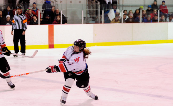 Kathryn Noreen unleashes a shot during a last-minute push in Saturday’s 4-2 loss to North Pole at Treadwell Ice Arena.