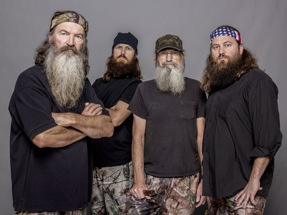 Four of the stars of Duck Dynasty, from left to right: Phil Robertson, Jase Robertson (Phil's son), Si Robertson (Phil's brother) and Willie Robertson (Phil's son). Zach Dilgard/AP