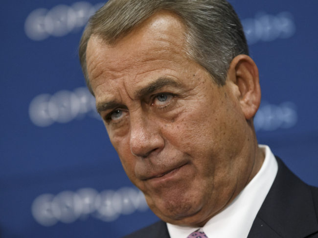 House Speaker John Boehner and GOP leaders face reporters on Capitol Hill in Washington, on Tuesday. J. Scott Applewhite/AP