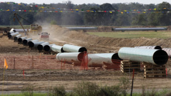 A 2012 photo shows sections of pipe on a neighboring property to Julia Trigg Crawford family farm in Sumner Texas, in the path of the Keystone pipeline. TransCanada said today that it is delivering oil through the Gulf Coast portion of its proposed Keystone XL pipeline, from a hub in Cushing, Okla., to Houston-area refineries. Tony Gutierrez/AP