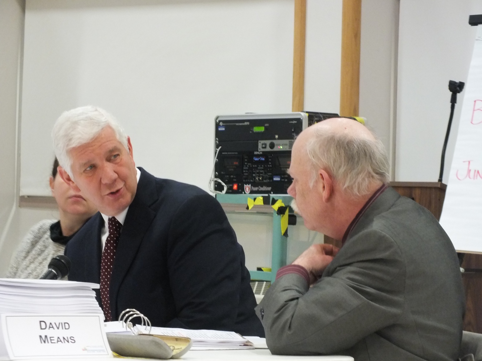 Juneau School District Superintendent Glenn Gelbrich talks with district Administrative Services Director David Means Tuesday at the district Budget Committee meeting. Photo by Casey Kelly/KTOO.