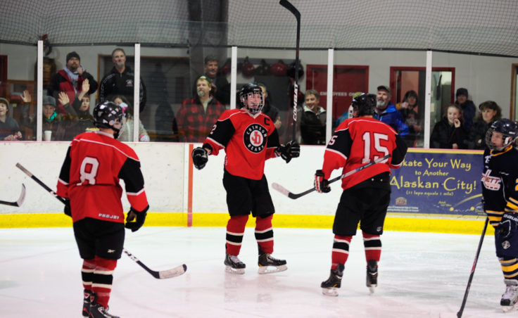 Juneau Captain Grant Ainsworth celebrates a goal during the second of two games against Bartlett High at Treadwell Ice Arena.