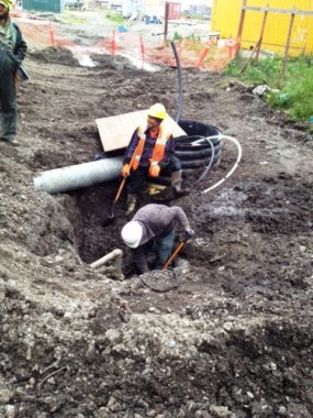 A crew works on a sewer system in a rural Alaska village. Photo courtesy USDA Rural Development.