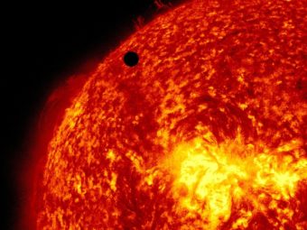 A view of Venus, black dot at top center, passing in front of the sun during a transit in 2012. A quarter of Americans questioned failed to answer correctly the most basic questions on astronomy. AP