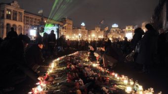 People light candles to honor victims of recent clashes between protesters and police on Independence Square in Kiev Monday. NATO and Russian officials shared their concerns about Ukraine's stability. Louisa Gouliamaki/AFP/Getty Images
