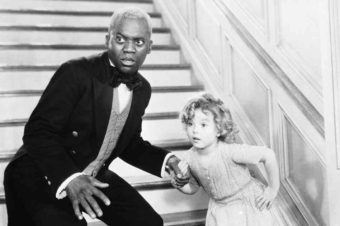 Bill Robinson, as the butler, teaches Shirley Temple his world-famous stair dance in a scene from The Little Colonel in 1935. AP