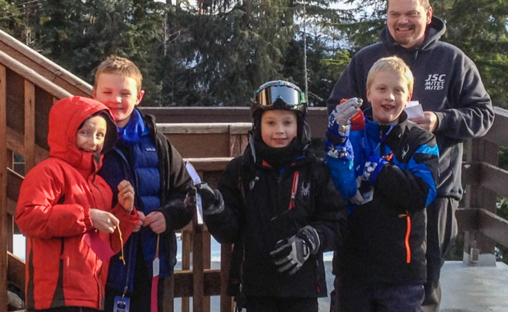 The Falcons ski group with coach Mike Satre. (L-R) Malachi Peimann, age 8; Sage Richards, 8; Karter Kohlhase, 8; and Adrian Whitney, 9. (Photo courtesy Dana Richards)
