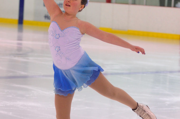 Katie McKenna strikes a graceful pose during her Free Skate 2 routine at Treadwell Ice Arena.