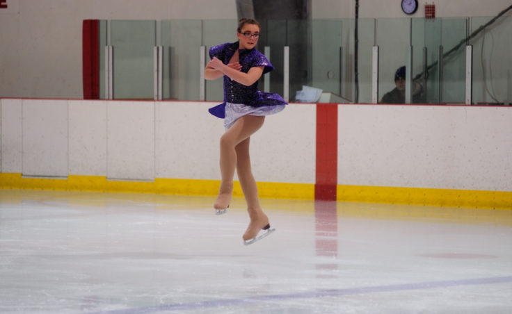 Emily Bowman gets air time during her routine at Treadwell Ice Arena Sunday.