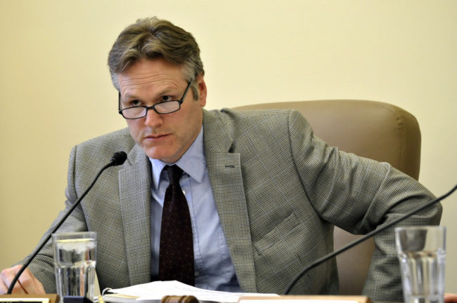 Sen. Mike Dunleavy, chairman of the Senate Labor and Commerce committee, listens during a meeting of the committee, Feb. 18, 2014. (Photo by Skip Gray/Gavel Alaska)