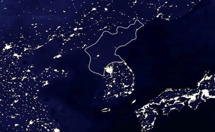 A 2002 satellite image of the Korean peninsula and neighboring lands and seas. North Korea's borders are outlined in white. NASA via Afrikent