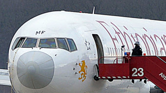 After landing in Geneva on Monday, the pilot who reportedly took over control of the Rome-bound Ethiopian Airlines jet used a rope to climb down from the cockpit. He then went to authorities and asked for asylum. Richard Juilliart/AFP/Getty Images