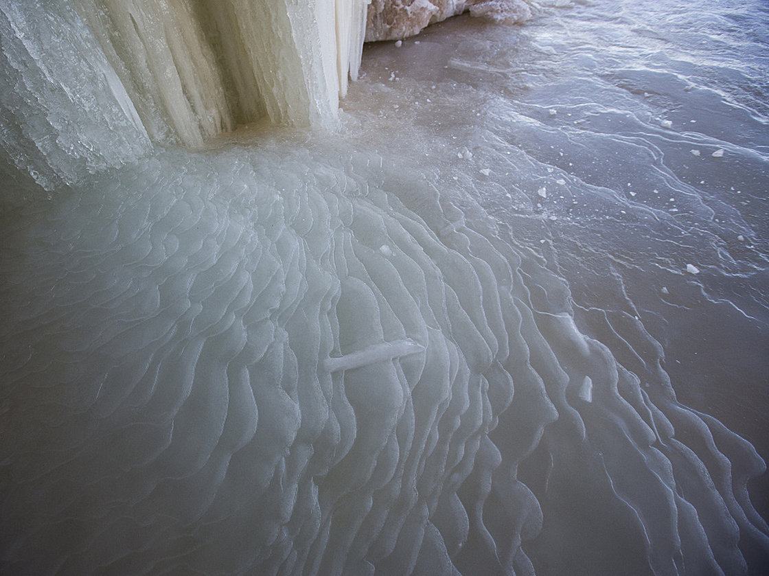 Waves of ice form in a sea cave on Lake Superior, after water dripped from icicles. Derek Montgomery/for MPR News