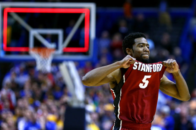 Chasson Randle of Stanford celebrates defeating the Kansas Jayhawks during the third round of the 2014 NCAA Men's Basketball Tournament. Dilip Vishwanat/Getty Images