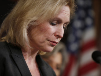 Sen. Kirsten Gillibrand (D-NY) pauses while speaking at a news conference on Capitol Hill in Washington, on Thursday following the Senate vote on the military sexual assaults bill she sponsored. Charles Dharapak/AP
