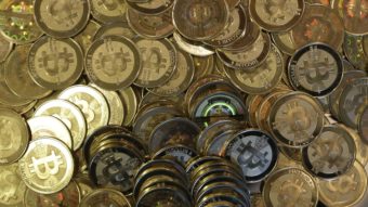 A photo of tokens representing bitcoins. Rick Bowmer/AP