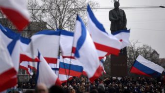 Russian and Crimean flags were being waved during a pro-Russia rally Sunday in Simferopol's Lenin Square. Simferopol is the capital of Crimea, an autonomous region of Ukraine. Filippo Monteforte /AFP/Getty Images