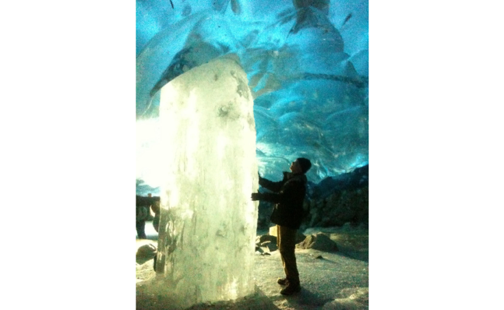 Backlit ice pillar