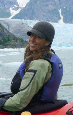 Outgoing SEACC Executive Director Malena Marvin poses while kayaking in Juneau's Mendenhall Lake. (SEACC Photo)