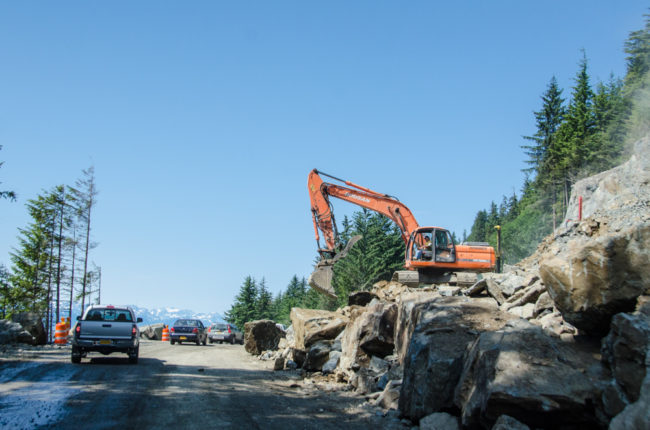 Construction has extended Glacier Highway to Cascade Point. Here crews are shown working on widening parts of the existing road in June of 2013. (Photo by Heather Bryant/KTOO)
