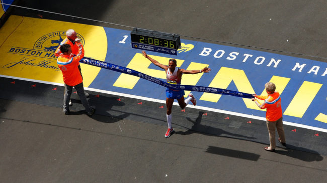 American Meb Keflezighi crosses the finish line in first place to win the 2014 B.A.A. Boston Marathon on Monday. He became the first American man to win the Boston Marathon since 1983. Jared Wickerham/Getty Images