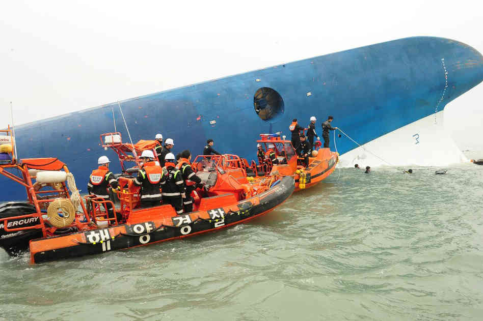 Republic of Korea Coast Guard continues their rescue work around the site of ferry sinking accident off the coast of Jindo Island on Wednesday in Jindo-gun, South Korea. Four people are confirmed dead and almost 300 are reported missing. The ferry identified as the Sewol is reported to have been carrying around 470 passengers, including students and teachers, as it travelled to Jeju island. The Republic of Korea Coast Guard/Getty Images
