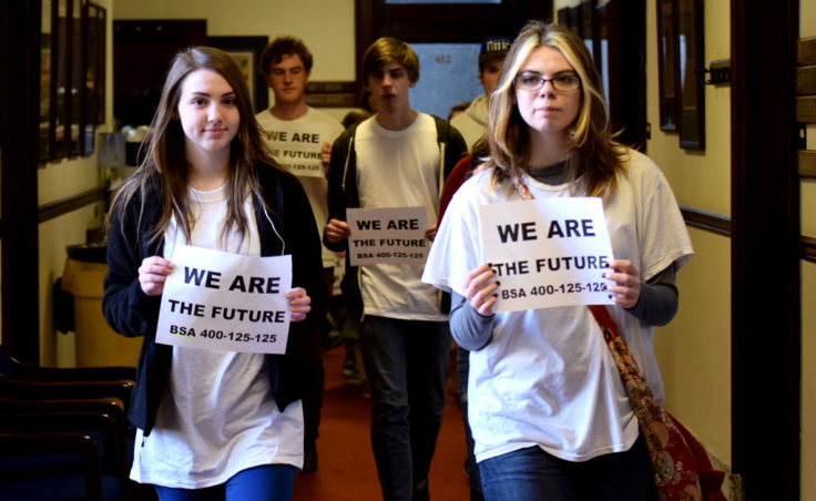 A pack of 18 youths walked the halls of the State Capitol, April 16, 2014, in a silent demonstration asking for more education funding. Bridget Galvin, a junior at Steller Secondary School in Anchorage and founder of Students With a Voice organized the event. (Skip Gray/Gavel Alaska)