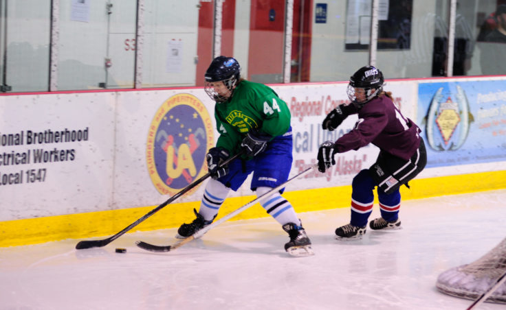 Treadwell’s Caroline Schultz closely marks White Pass’ Olivia Hoess in a 1-0 Women’s Tier title game won by White Pass.