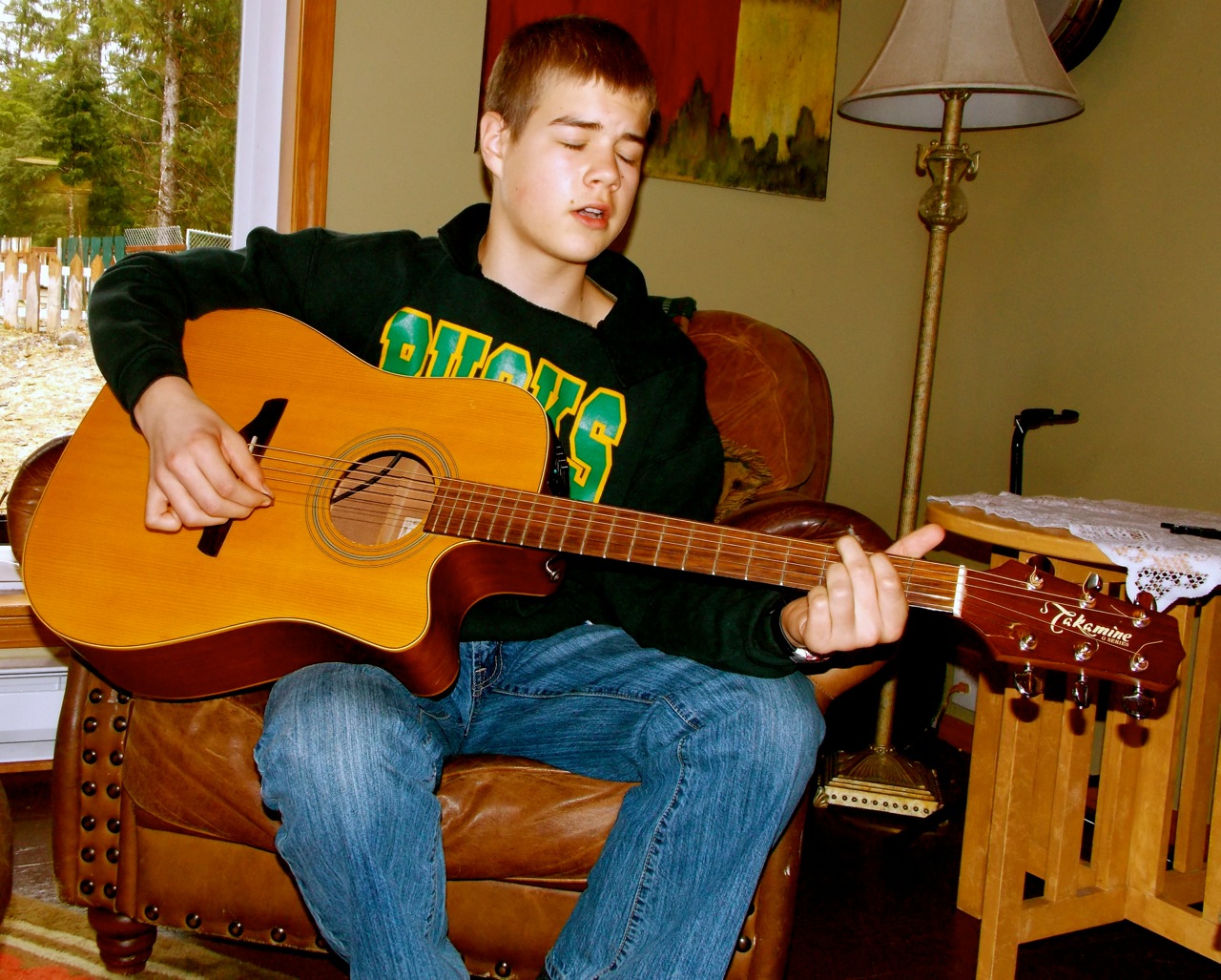 Koren Sperl, 13, plays guitar in Double Rock Band. (Photo by Angela Denning/KFSK)