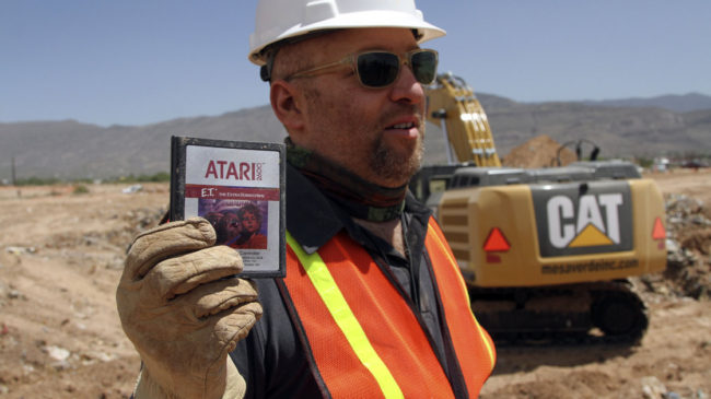 Film director Zak Penn shows a cartridge of the Atari game E.T. The Extra-Terrestrial, which was released in 1982. Millions of copies of the game are rumored to be in a New Mexico landfill. Juan Carlos Llorca/AP