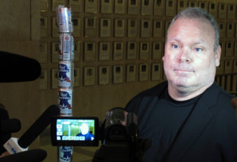 Chaz Stevens talks with reporters after setting up his Festivus pole made out of beer cans at the Florida Capitol building in Tallahassee, Fla., in December of 2013. Brendan Farrington/AP