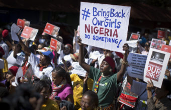 The effort to find hundreds of abducted Nigerian schoolgirls has gone international — and so has anger over the mass kidnapping, as evidenced by this protest Thursday in South Africa. Retired Gen. Carter Ham says there's still a chance for the U.S. to help. Ben Curtis/AP