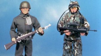 At left is a reproduction of the original G.I. Joe action figure made in 1964. The doll on the right is a newer G.I. Joe model. Hasbro executive Donald Levine, who oversaw the action figure's creation, died last week of cancer. Anonymous/AP