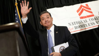 Secretary of Veterans Affairs Eric Shinseki waves after addressing the National Coalition for Homeless Veterans in Washington Friday. Shinseki is under bipartisan pressure to resign amid problems with the agency's medical care system. Win McNamee/Getty Images