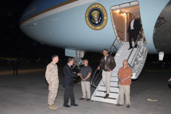 President Barack Obama is greeted by U.S. Ambassador to Afghanistan James Cunningham and Marine General Joseph Dunford, commander of the U.S.-led International Security Assistance Force (ISAF), as he steps off Air Force One at Bagram Air Field in Afghanistan. Evan Vucci/AP
