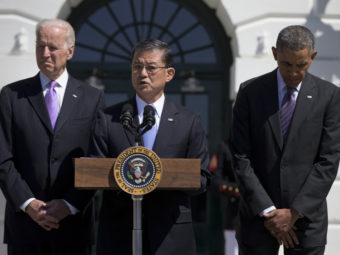 Veterans Affairs Secretary Eric Shinseki, flanked by President Obama and Vice President Biden, at the White House last month. Carolyn Kaster/AP