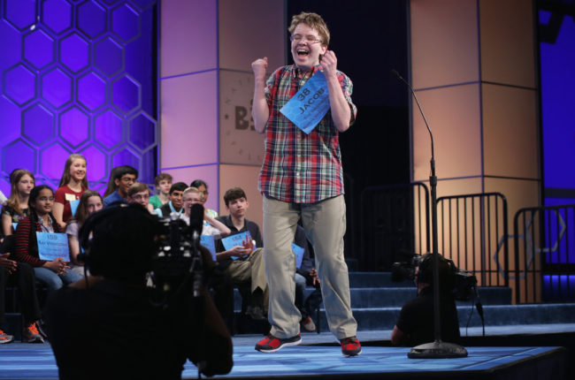Speller Jacob Daniel Williamson of Cape Coral, Fla., reacts after he correctly spelled a word during round five of the 2014 Scripps National Spelling Bee competition Thursday. He made it to the finals — and won fans with his enthusiasm. Alex Wong/Getty Images
