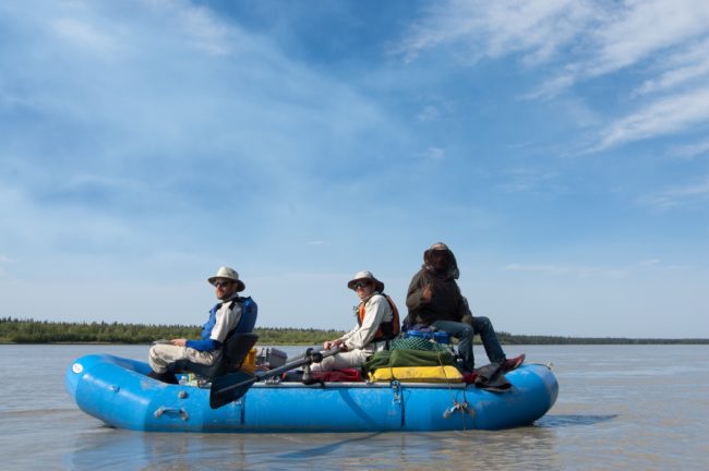 From left, Matt Gardine, Carl Tape and Celso Alvizuri float the Tanana River in summer 2013 as part of an exploratory trip to scout sites for seismic stations. (Photo by Mike West)