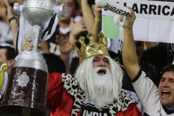 The kings of positive feelings: Paraguay's citizens were found to have the most positive things to say about their lives, according to a recent poll. Here, soccer fans cheer for Paraguay's Olimpia team last year. Nelson Antoine/AP