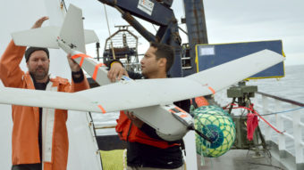 A 2011 photo shows an AeroVironment Puma drone being prepared for launch by University of Alaska researchers. The FAA says it approved BP's use of the drone to survey oil fields in Alaska. Keith Cunningham/AP