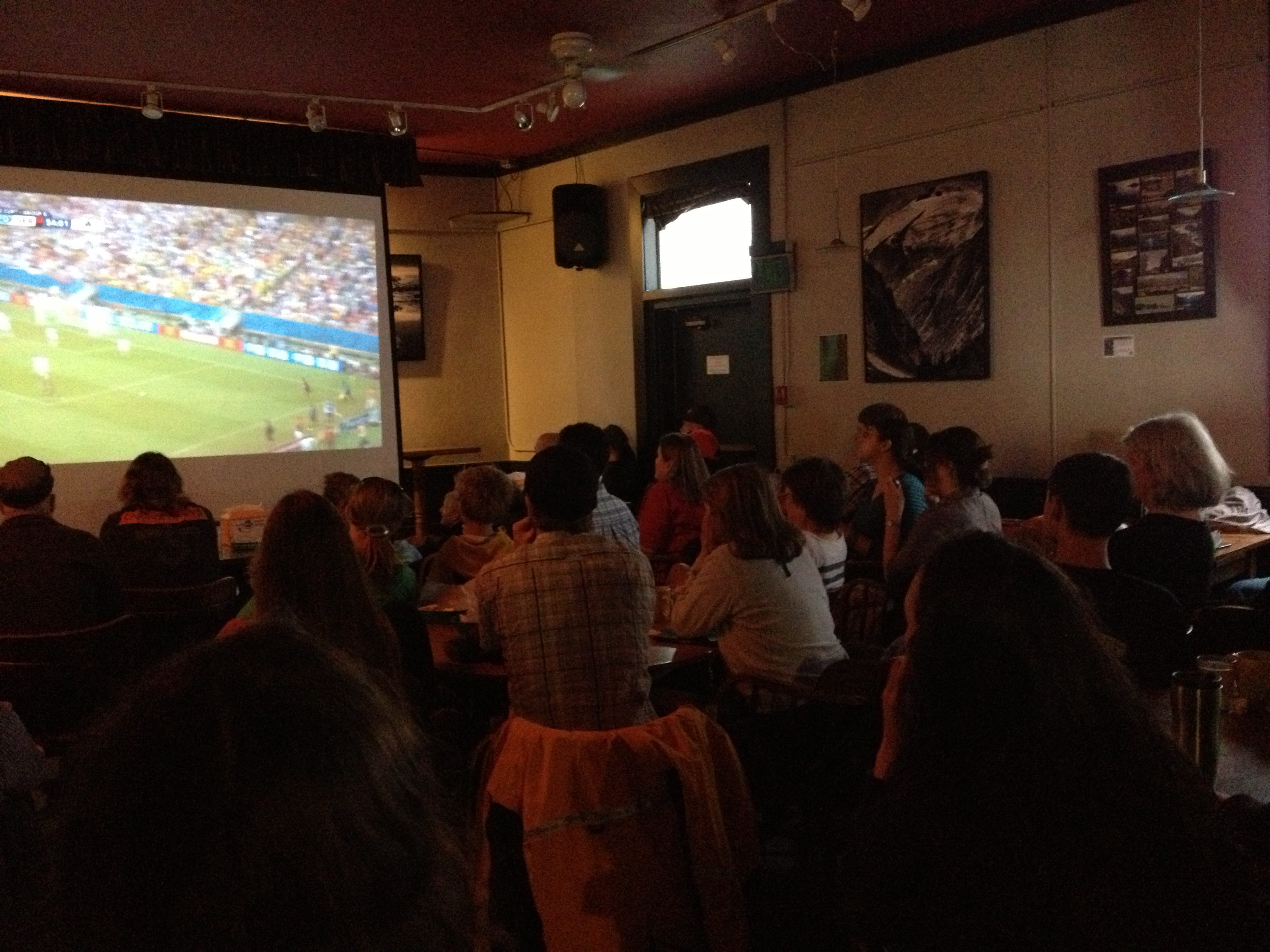 More than a hundred people watched the USA-Germany match of the FIFA World Cup Thursday morning at Silverbow Bakery. (Photo by Lisa Phu/KTOO)