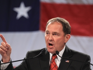 Utah Gov. Gary Herbert addresses a crowd during a rally at the Western Republican Leadership Conference in Sandy, Utah, in April. Herbert reiterated his support of the state's same-sex marriage ban, which was struck down Wednesday by a federal panel. Rick Bowmer/AP