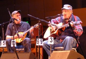 Juneau’s Pat Henry, right, and Bob Banghart, left, performing as We’re Still Here in April’s festival. The two are the only musicians to have played at all 40 events.