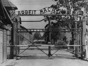 The Nazi concentration camp Auschwitz I in Poland, circa 1945. Writing over the gate reads "Arbeit macht frei" (Work Sets You Free). Johann Breyer has admitted to working as a guard at the camp but says he only supervised work parties outside the gates. Uncredited/AP