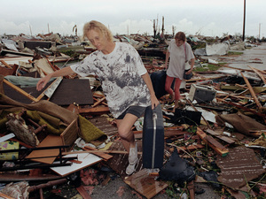 In 1992, Hurricane Andrew destroyed more than 25,000 homes in Florida. But its death toll was far less than "female" storms such as Audrey, Camille and Katrina. Lynn Sladky/AP