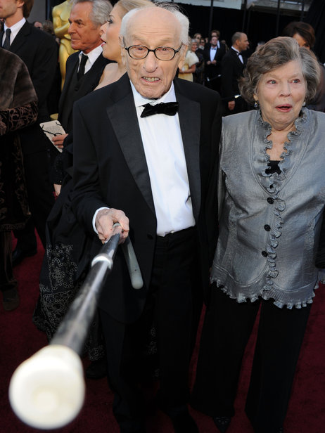 Eli Wallach arrives at the 2011 Academy Awards with his wife, Anne Jackson. Wallach died Tuesday. Jason Merritt/Getty Images