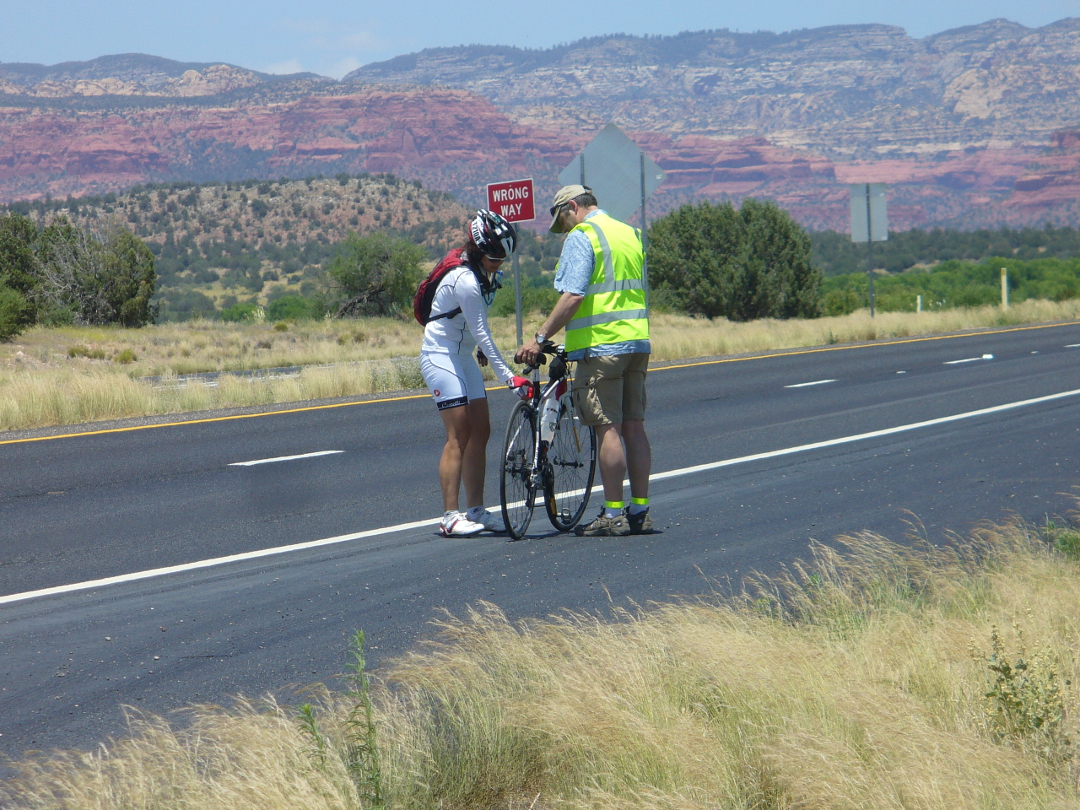 Janice Sheufelt and her husband Jim check on her bike during the 2013 Race Across America. After setting a record with racing partner Joel Sothern in a mixed gender team division last year, Sheufelt won RAAM's solo female under 50 division this year. (Photo courtesy Peter Apathy)